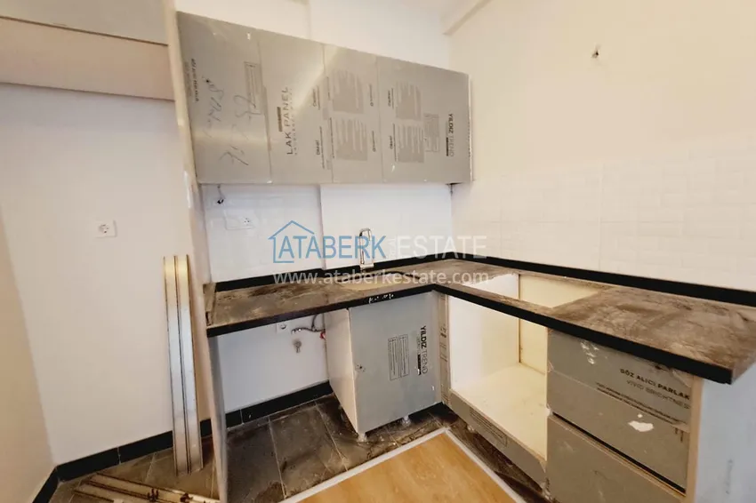 Приобрести Двухкомнатная квартира в Махмутларе с рассрочкой в новостройке 4