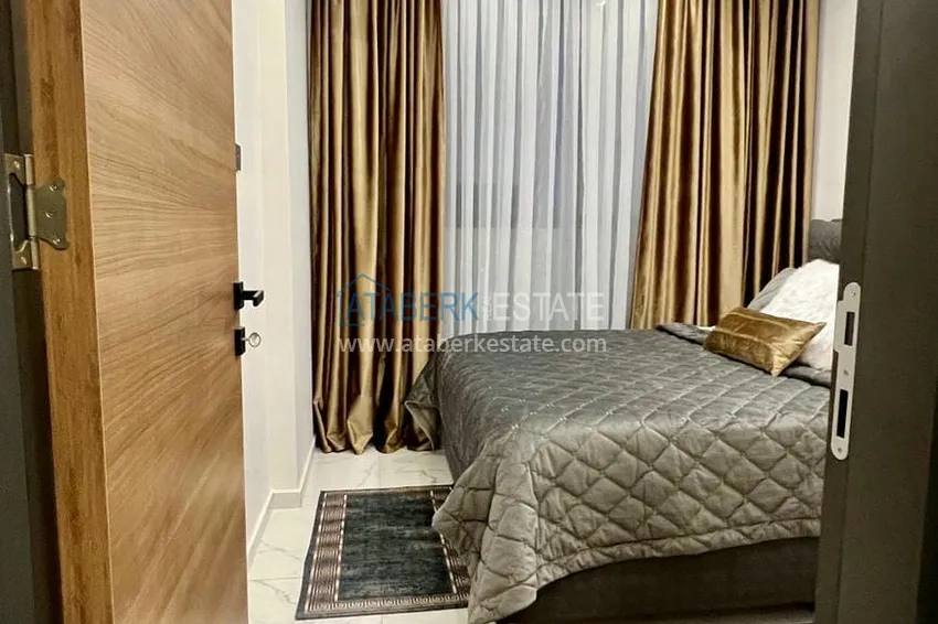 Приобрести Квартира 1+1 с новой мебелью и видом на море, район Махмутлар – Алания 6 