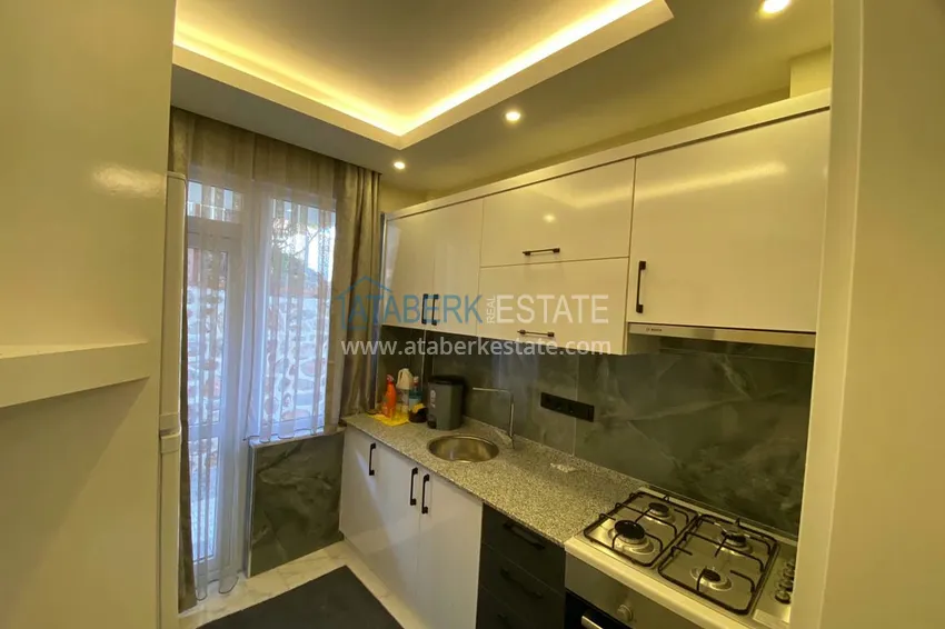 Приобрести Двухкомнатная квартира после ремонта с мебелью и панорамным видом на море в исторической части Алании – Кале 7 