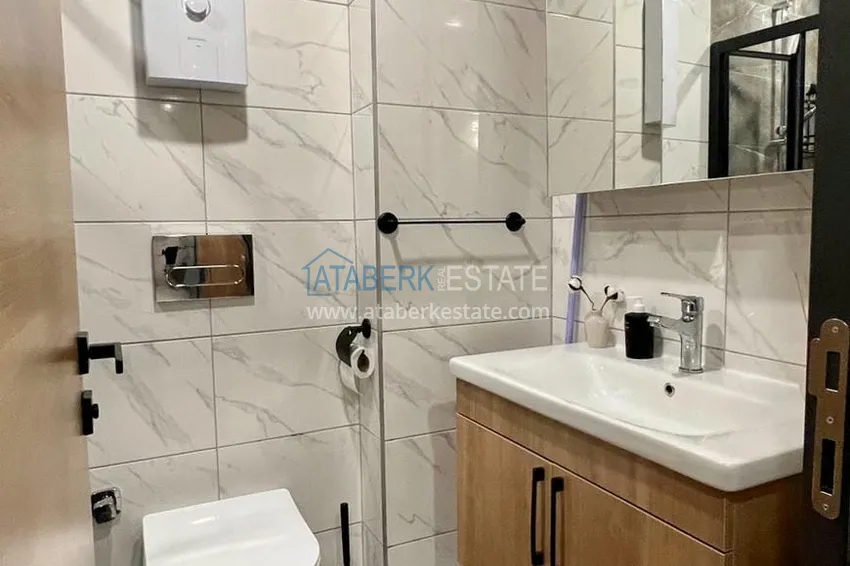 Приобрести Квартира 1+1 с новой мебелью и видом на море, район Махмутлар – Алания 8 