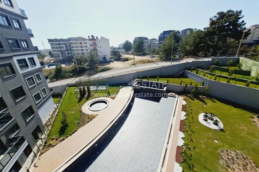 Приобрести Квартира с новой мебелью от собственника в новом комплексе сегмента комфорт в районе Авсаллар 8 