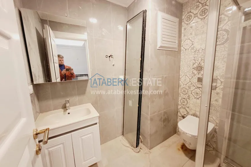 Приобрести Двухкомнатная квартира в Махмутларе с рассрочкой в новостройке 9