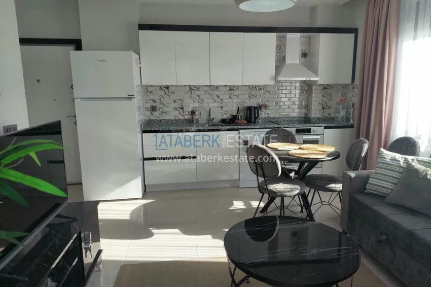 Приобрести Меблированная двухкомнатная квартира в районе Авсаллар. Новостройки Алании 9 