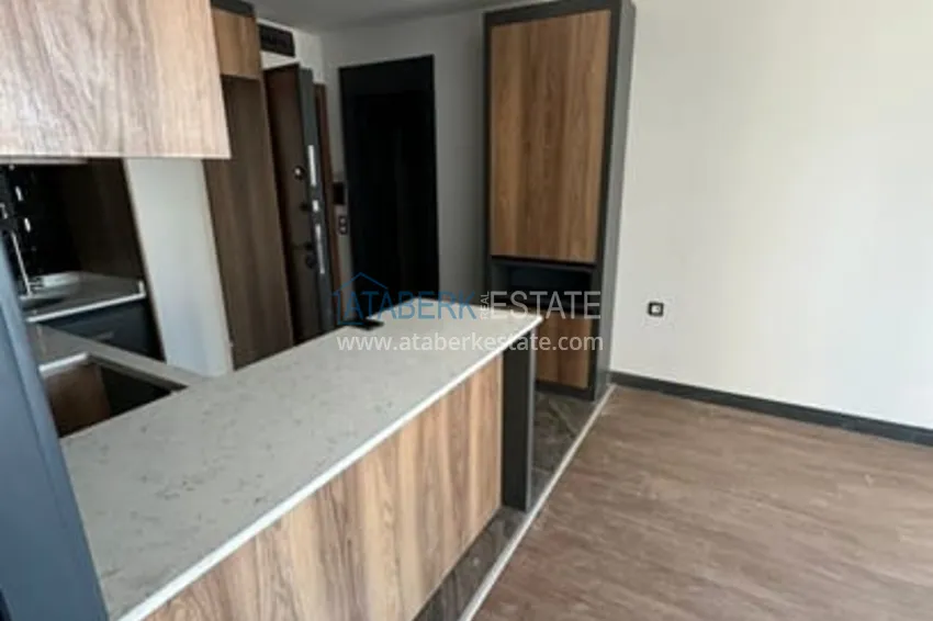 Приобрести Квартира 1+1 с чистовой отделкой и видом на море в районе Чешмели – Мерсин 3 