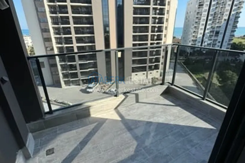 Приобрести Квартира 1+1 с чистовой отделкой и видом на море в районе Чешмели – Мерсин 9 