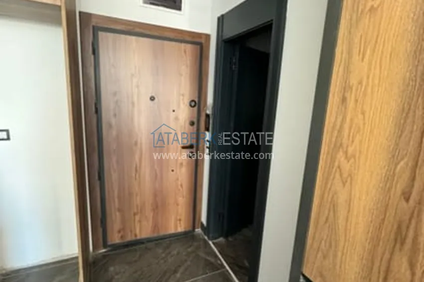 Приобрести Квартира 1+1 с чистовой отделкой и видом на море в районе Чешмели – Мерсин 4 