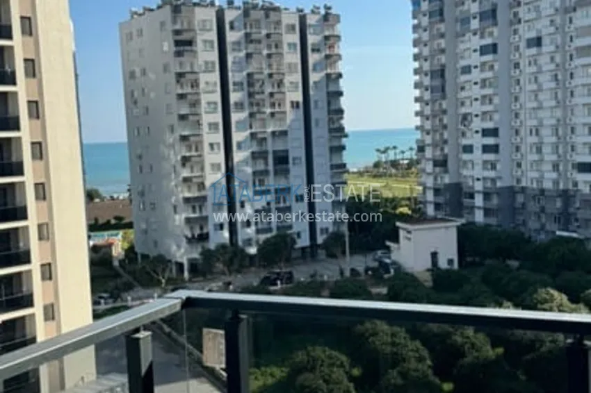 Приобрести Квартира 1+1 с чистовой отделкой и видом на море в районе Чешмели – Мерсин 10 