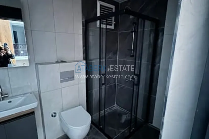 Приобрести Квартира 1+1 с чистовой отделкой и видом на море в районе Чешмели – Мерсин 8 