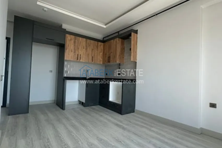 Приобрести Квартира 1+1 с видом на море и чистовой отделкой район Тедже-Мерсин 1 