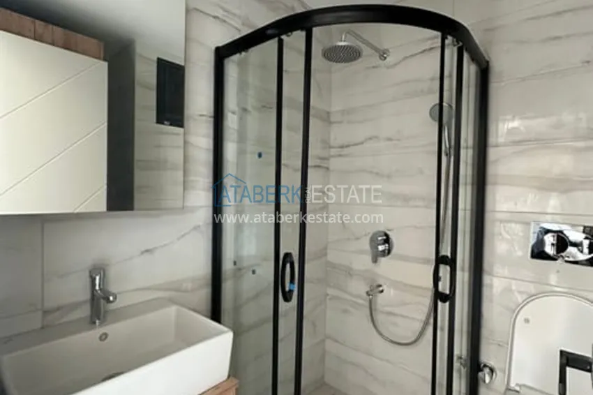 Приобрести Квартира 1+1 с видом на море и чистовой отделкой район Тедже-Мерсин 8 