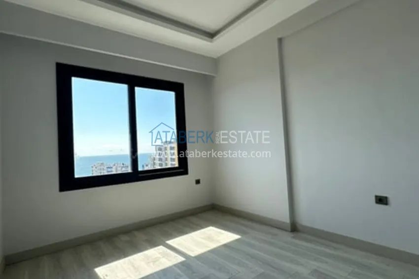 Приобрести Квартира 1+1 с видом на море и чистовой отделкой район Тедже-Мерсин 6 