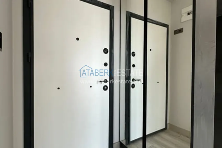 Приобрести Квартира 1+1 с видом на море и чистовой отделкой район Тедже-Мерсин 7 