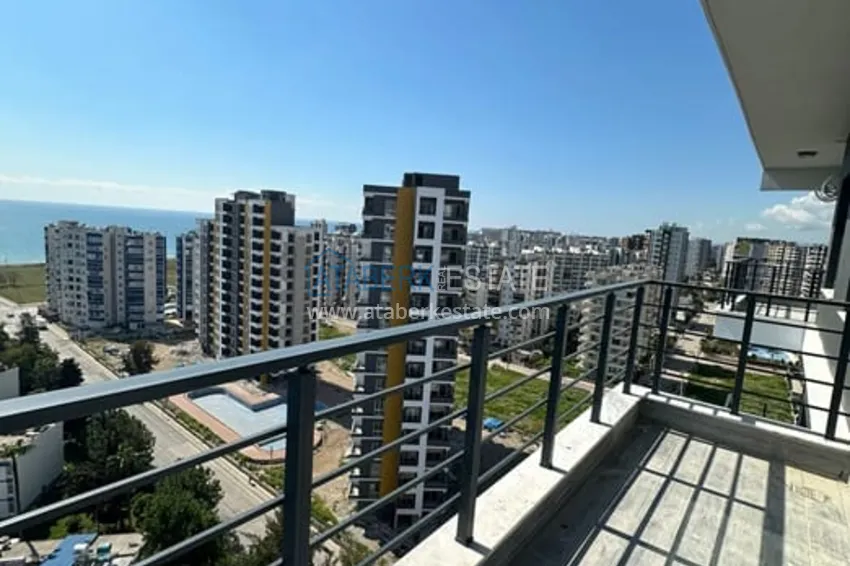 Приобрести Квартира 1+1 с видом на море и чистовой отделкой район Тедже-Мерсин 11 