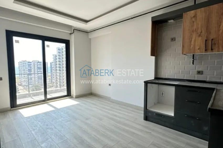 Квартира 1+1 с чистовой отделкой в 100 метрах от моря район Тедже-Мерсин 1 