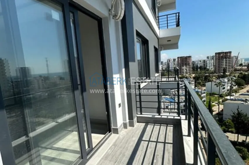 Приобрести Квартира 1+1 с чистовой отделкой в 100 метрах от моря район Тедже-Мерсин 9 