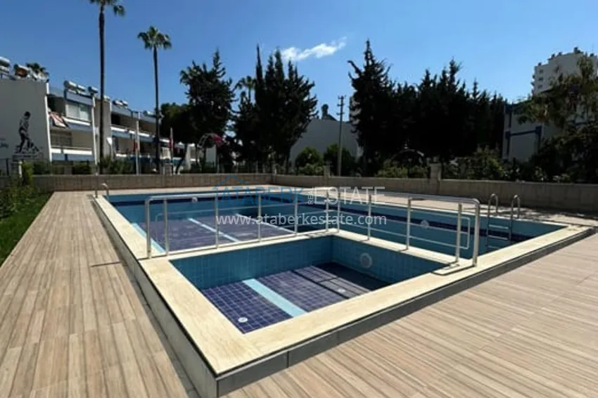 Квартира 1+1 с чистовой отделкой в 100 метрах от моря район Тедже-Мерсин 2 