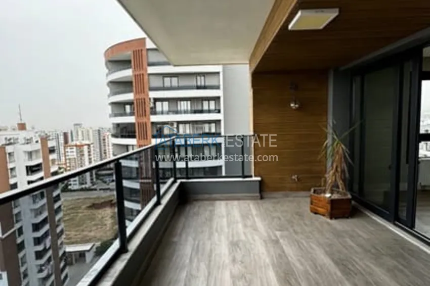 Приобрести Квартира 4+1 с роскошным ремонтом в комплексе отельного типа в районе Мезитли-Мерсин 21 