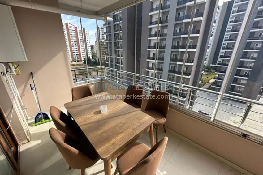 Приобрести Уютная трехкомнатная квартира с остекленным балконом в районе Мезитли-Мерсин 10 