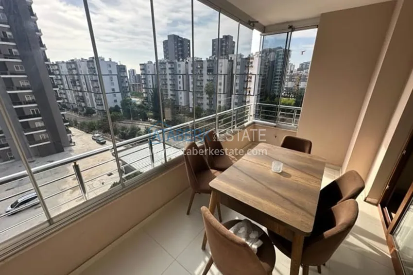 Приобрести Уютная трехкомнатная квартира с остекленным балконом в районе Мезитли-Мерсин 12 