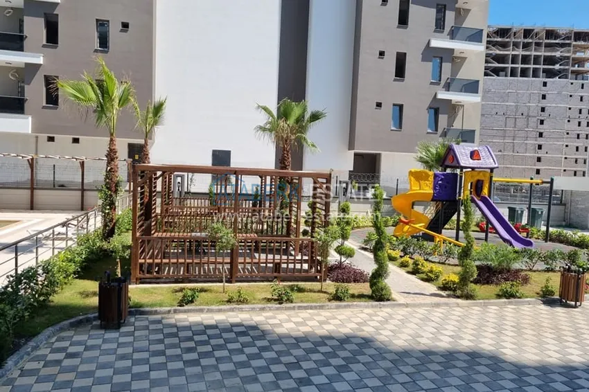 Квартира 1+1 с чистовой отделкой и видом на море район Арпачбахшиш-Мерсин 9 