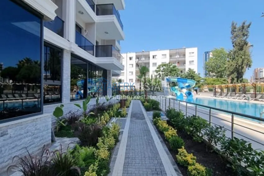 Квартира 1+1 с чистовой отделкой и видом на море район Арпачбахшиш-Мерсин 10 