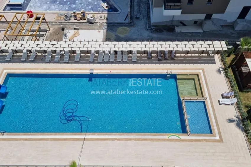 Квартира 1+1 с чистовой отделкой и видом на море район Арпачбахшиш-Мерсин 6 