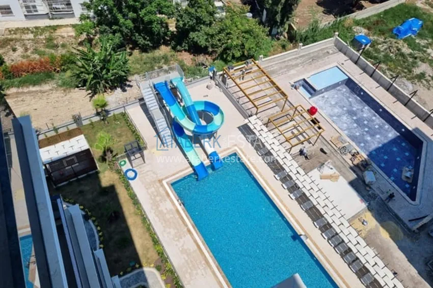 Квартира 1+1 с чистовой отделкой и видом на море район Арпачбахшиш-Мерсин 7 