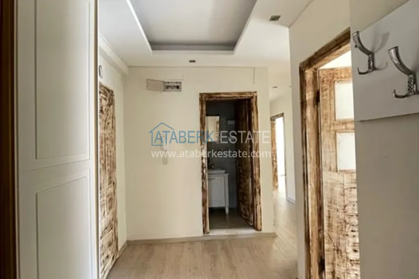 Приобрести Квартира 3+1 с отдельной кухней в 100 метрах от моря район Мезитли-Мерсин 23 