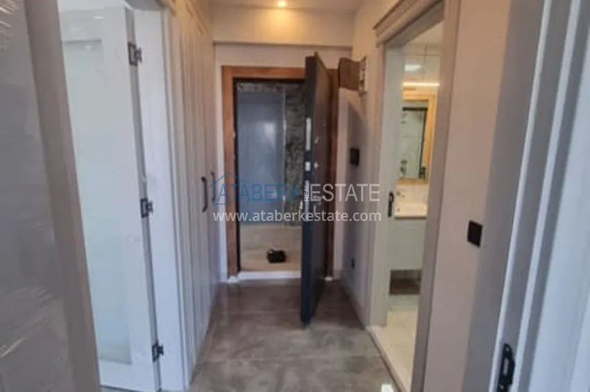 Приобрести Квартира 1+1 с чистовой отделкой и видом на море район Арпачбахшиш-Мерсин 11 