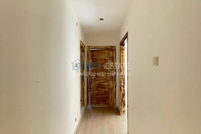 Приобрести Квартира 3+1 с отдельной кухней в 100 метрах от моря район Мезитли-Мерсин 24 