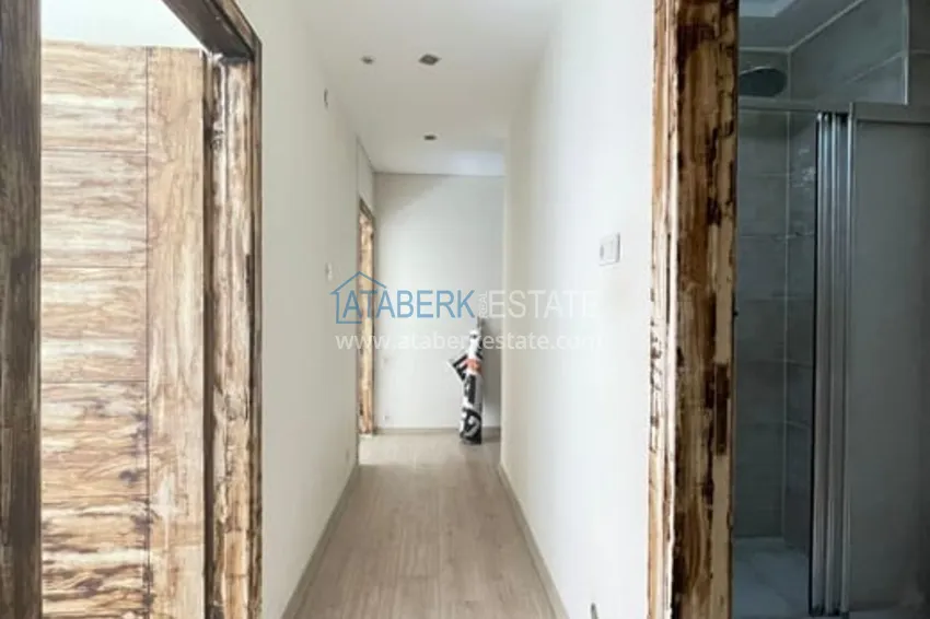 Приобрести Квартира 3+1 с отдельной кухней в 100 метрах от моря район Мезитли-Мерсин 25 