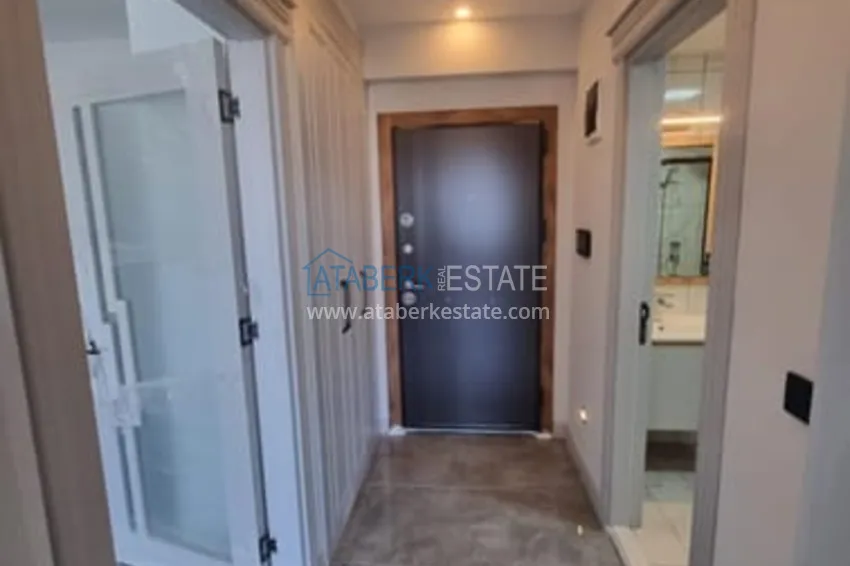 Приобрести Квартира 1+1 с чистовой отделкой и видом на море район Арпачбахшиш-Мерсин 12 