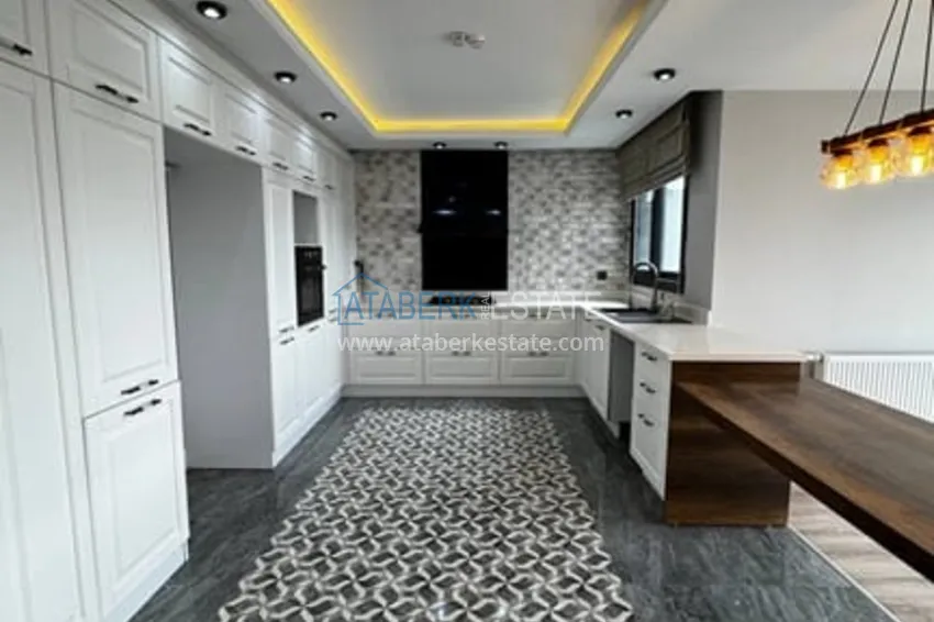 Приобрести Квартира 4+1 с роскошным ремонтом в комплексе отельного типа в районе Мезитли-Мерсин 12 