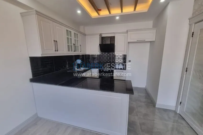 Приобрести Квартира 1+1 с чистовой отделкой и видом на море район Арпачбахшиш-Мерсин 4 