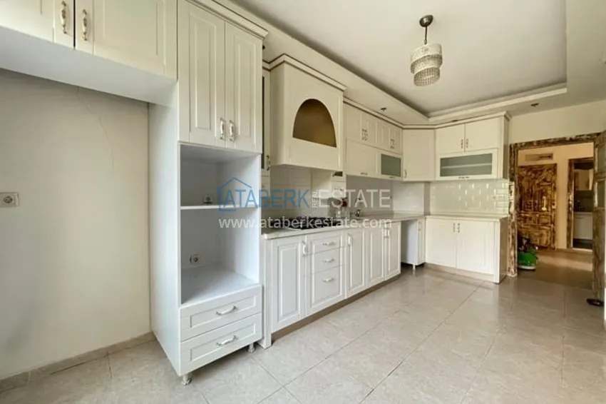 Приобрести Квартира 3+1 с отдельной кухней в 100 метрах от моря район Мезитли-Мерсин 21 