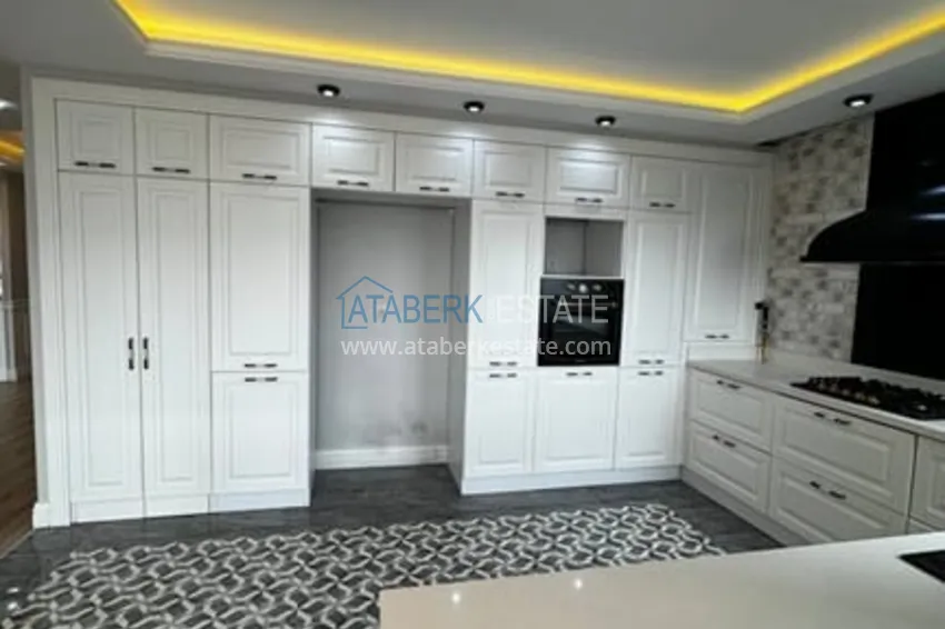 Приобрести Квартира 4+1 с роскошным ремонтом в комплексе отельного типа в районе Мезитли-Мерсин 13 