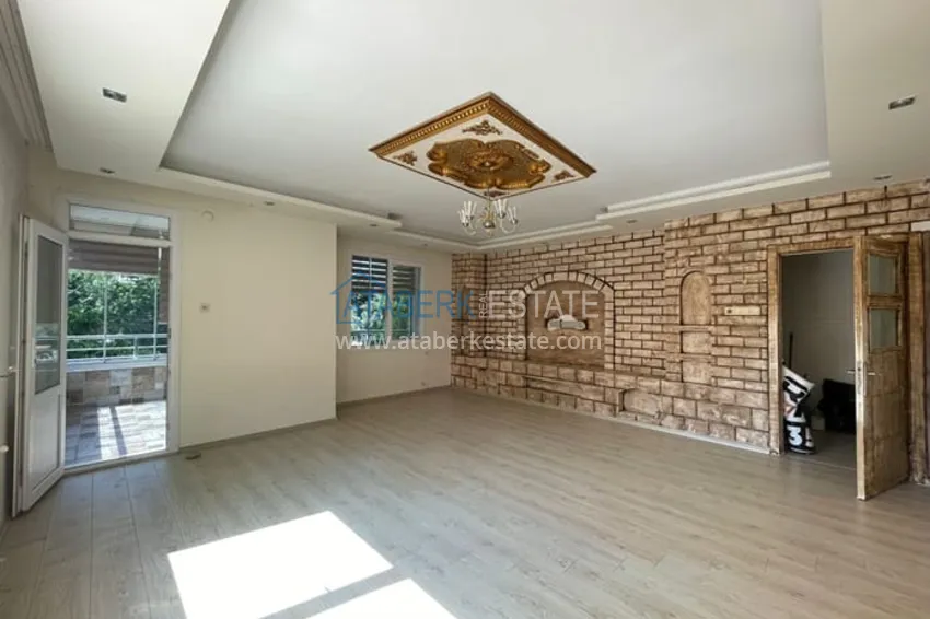 Приобрести Квартира 3+1 с отдельной кухней в 100 метрах от моря район Мезитли-Мерсин 1 