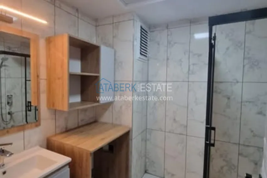 Приобрести Квартира 1+1 с чистовой отделкой и видом на море район Арпачбахшиш-Мерсин 13 