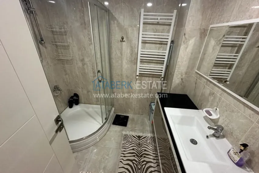 Приобрести Уютная трехкомнатная квартира с остекленным балконом в районе Мезитли-Мерсин 6 