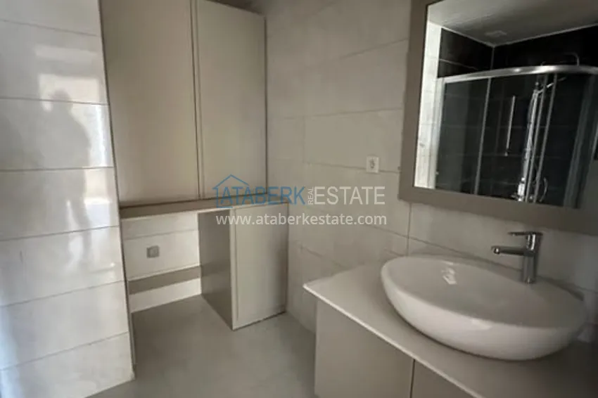 Приобрести Дуплекс 4+1 с собственным садом в районе Мезитли-Мерсин 15 