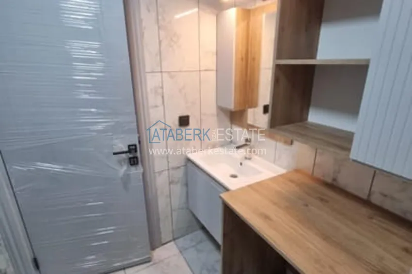 Приобрести Квартира 1+1 с чистовой отделкой и видом на море район Арпачбахшиш-Мерсин 17 