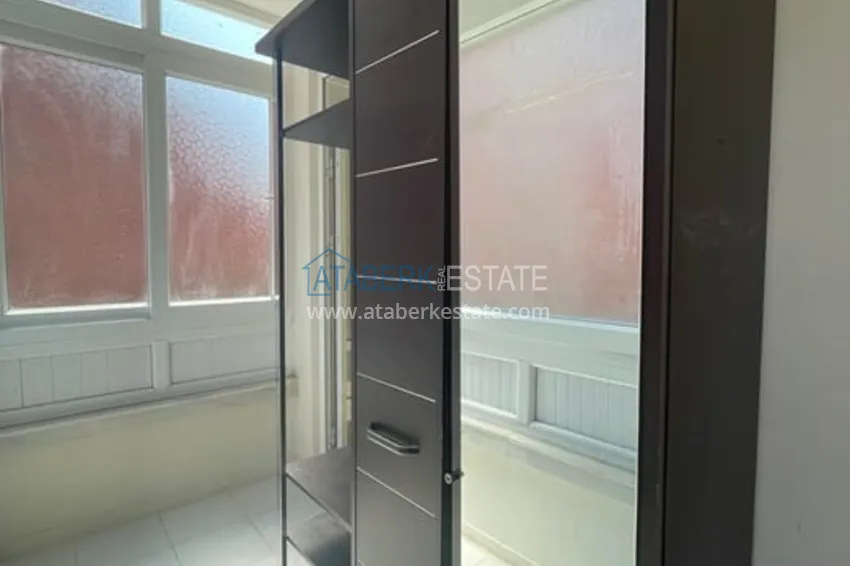 Приобрести Квартира 3+1 с отдельной кухней в 100 метрах от моря район Мезитли-Мерсин 13 