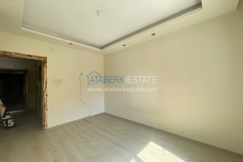 Приобрести Квартира 3+1 с отдельной кухней в 100 метрах от моря район Мезитли-Мерсин 7 