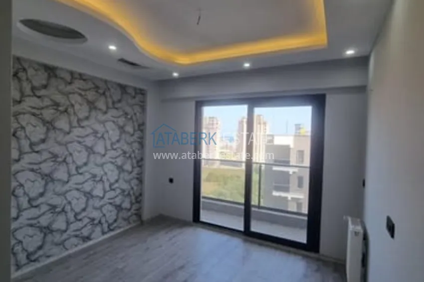 Приобрести Квартира 1+1 с чистовой отделкой и видом на море район Арпачбахшиш-Мерсин 10 