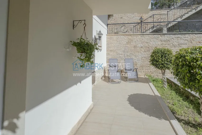 Приобрести Меблированный садовый дуплекс с двумя спальнями, застекленным балконом и видом на море в Алании 11 