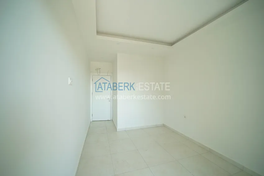 Приобрести Квартиры и пентхаусы с чистовой отделкой различных планировок в районе Махмутлар – Новостройка  18 