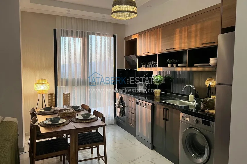 Приобрести Двухуровневый пентхаус «под ключ» с открытым видом на море и горы – новостройки Алании, район Махмутлар 11 