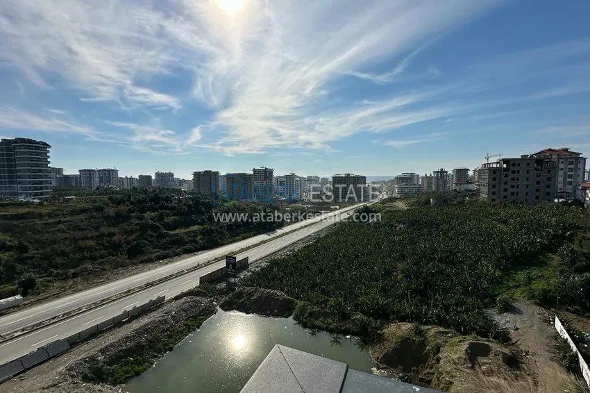 Приобрести Двухкомнатная квартира с видом на море и горы в новостройке – Алания, район Махмутлар 13