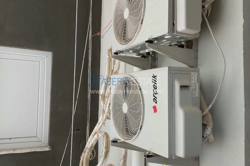 Приобрести Двухкомнатная квартира под ключ с застекленным балконом в Алании, район Авсаллар. Доступна рассрочка 13 