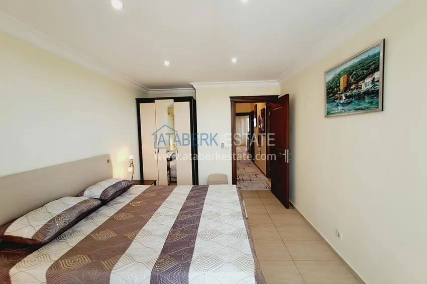 Приобрести Недвижимость под ВНЖ. Квартира от собственника с мебелью, застекленными балконами и видом на горы в Алании, район Тосмур 14 